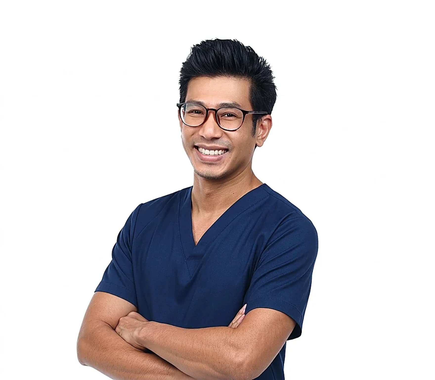 Dr Sulaiman smiling, wearing glasses and navy scrubs, arms folded, against a plain white background.